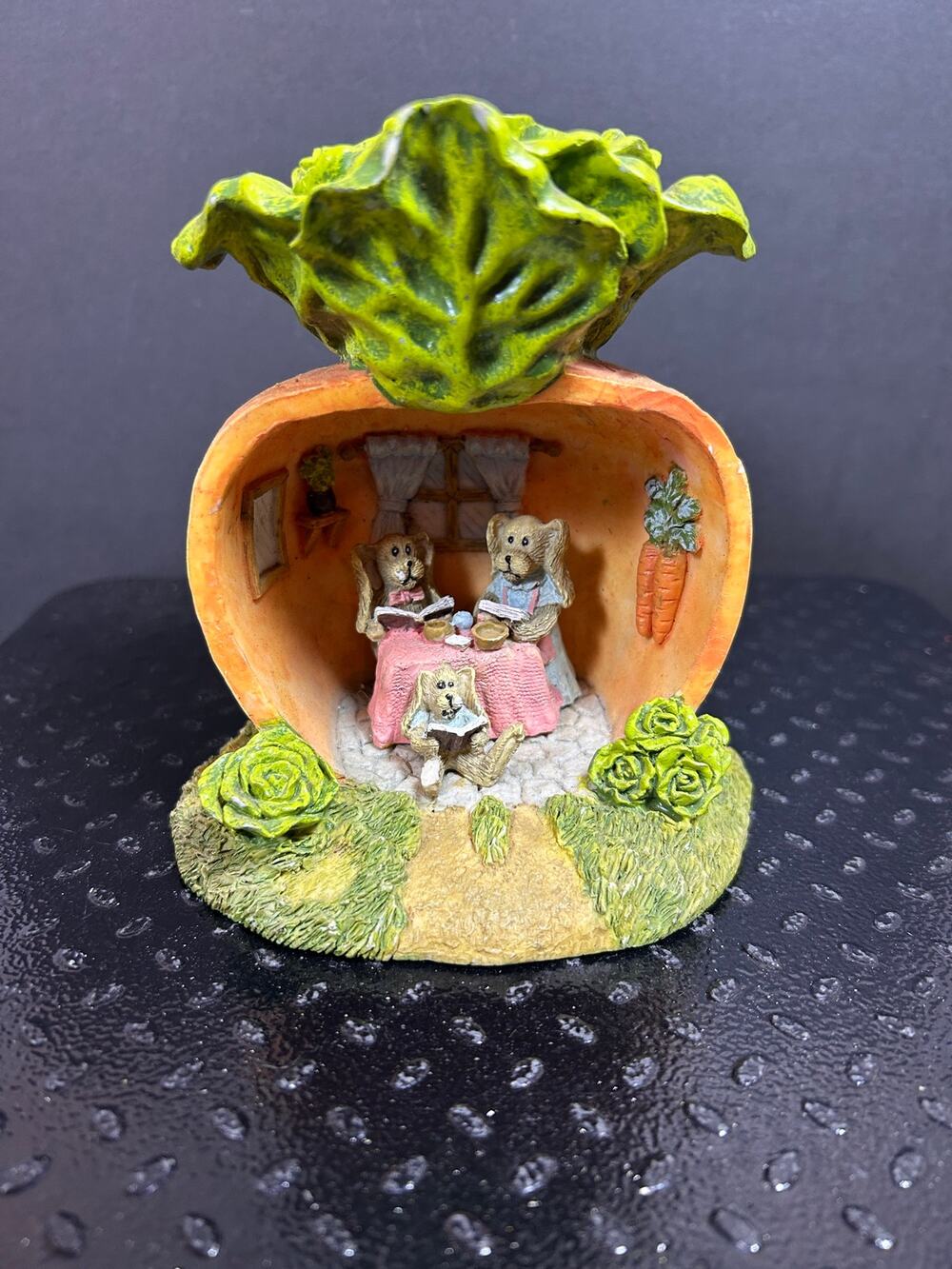 vintage CBK resin figurine with a family of rabbits inside a hollowed carrot.